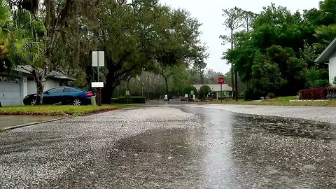 Rain over Clarendon Drive in New Port Richey, Florida