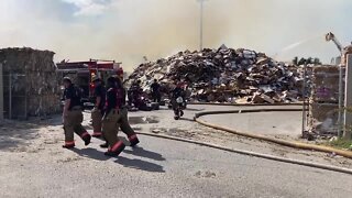 Fort Myers firefighters battling fire at A & D Scrap Materials