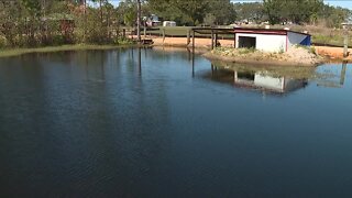 Local community still dealing with flooding months after Ian