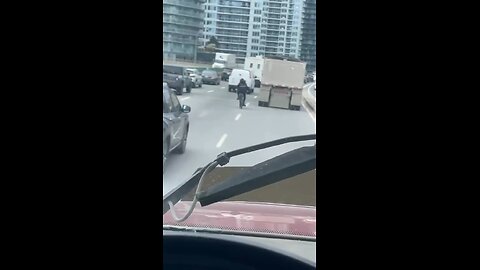 Uber Eats Riding Bike On Highway