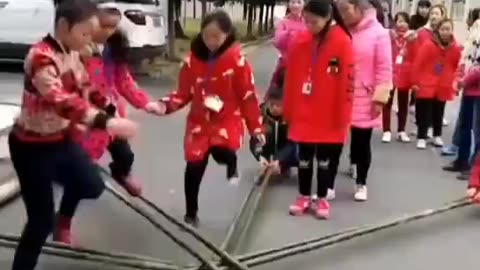 Girls' perfectly performing street game.
