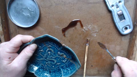 Traditional, lacquer based kintsugi, applying sabi