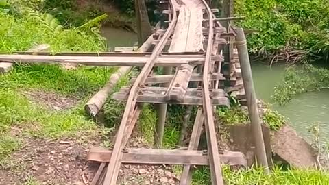 dangerous bridge with train