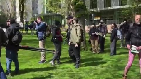 Pro-Palestine and Pro-Israel protestors fight at Portland State University as police arrive