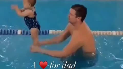 Cute baby girl showing her love for swimming