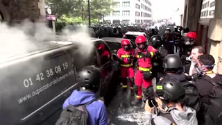 Tear gas used during May Day protests in Paris