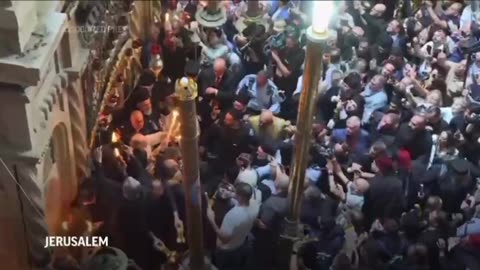Eastern orthodox worshipers throng holy fire ceremony in Jerusalem
