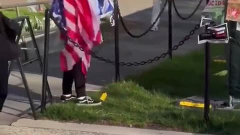 Student protester tears down an American flag at the MIT campus.It's only freedom when they agree