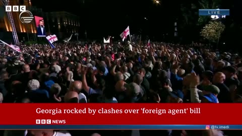 Georgia: Protesters hit by police watercannons after passing of 'Russian inspired' bill BBC News