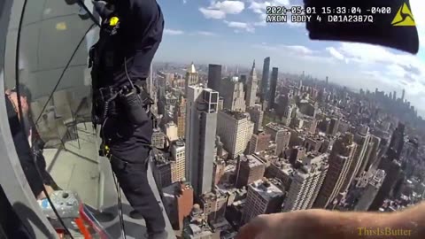 NYPD detectives jump over glass barrier to save distraught woman on ledge of 54-story NYC building