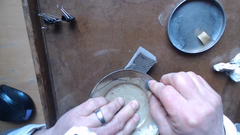 Traditional, lacquer based kintsugi, removing gold