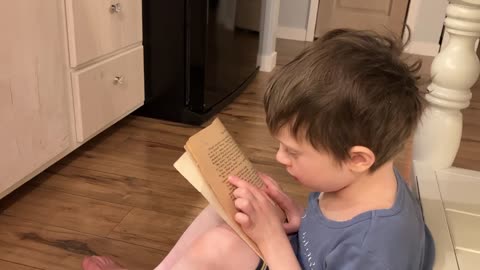 Corban Reading To Lilyanna While She Bakes Cookies - 1/30/23