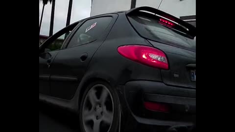 The Ultimate Black Peugeot 206: Upgraded with a Professional Racing Engine by an Iranian Enthusiast
