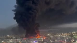 Breaking News: US Mexico border under atack, large fire seen