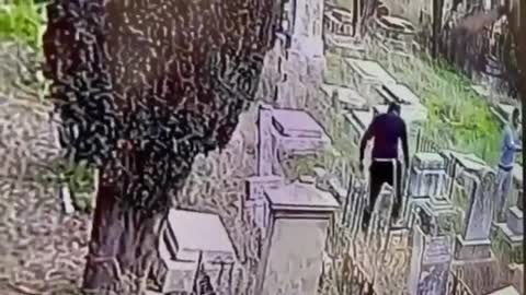 CCTV footage of Israeli colonizers desecrating christian graves.