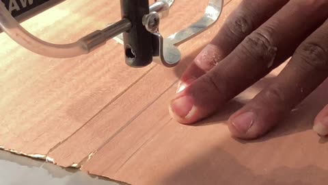 How we cut veneer using the scroll saw.