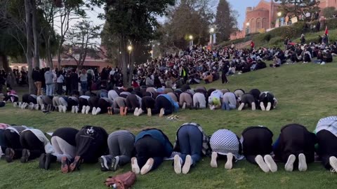 Hundreds of American students convert to Islam and participate in an Islamic call to prayer