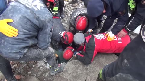 TURKEY EARTHQUAKE: Rescuer Who Shouts Into Hole If Anyone Is Alive Discovers Trapped Young Woman