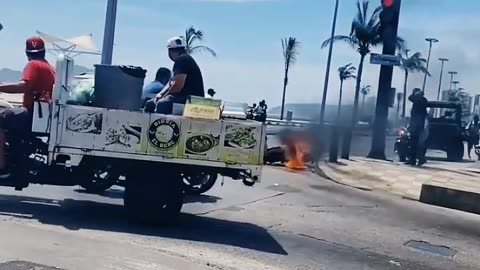 AMAZING! MOTORCYCLIST ON BUSY STREET SUDDENLY BURSTS INTO FLAMES 😖😖😖😖