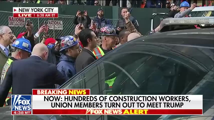 Trump met with cheers from hundreds of NYC construction workers