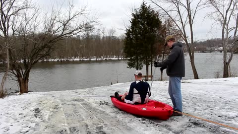 Kayak sledding snow day!! 300' of bungee cord + Kayak = kayak slingshot.