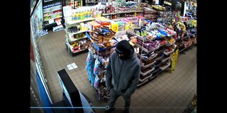 Surveillance video carjacking suspect