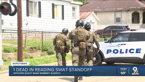 1 dead after officer shoots man in SWAT standoff