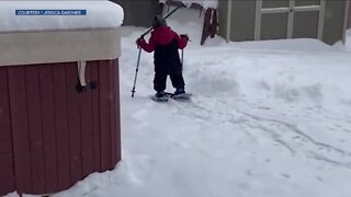 3-year-old Firestone boy tries out snowhoes