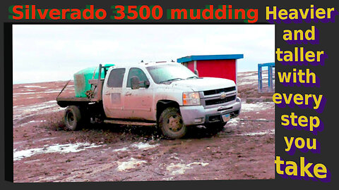 In the Trenches: Silverado 3500 Fights Through Mud to Water Ranch Animals