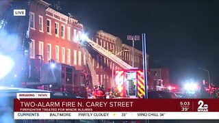 Firefighter injured, nearly a dozen displaced in 2-alarm fire in West Baltimore