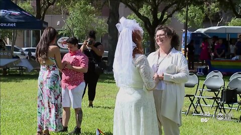 Group holds wedding ceremony to kick of Pride Month