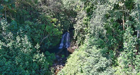 27-2433 HAWAII BELT ROAD - AERIAL OF WATERFALL AND SACRED BANANA PATCH
