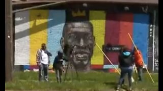TBT: George Floyd Mural Crumbles After Being Struck by Lightning