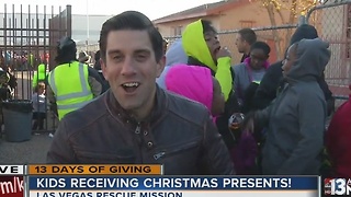 Children receive toys at 13 Days of Giving toy giveaway