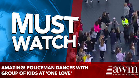 Amazing! Policeman dances with group of kids at 'One Love'