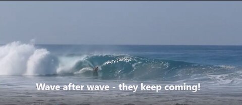 Surfers on Zicatela Beach in Puerto Escondido, Mexico