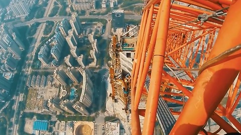 These Brave Daredevils Are Free Climbing On A 2,165 Foot Skyscraper