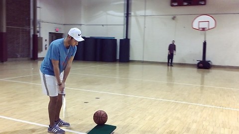 Dude sinks long basketball shot using golf club