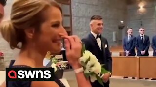 This groom's reaction to his bride walking down the aisle will give you all the feels