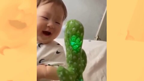 Cute Baby Talking With Cactus Toy