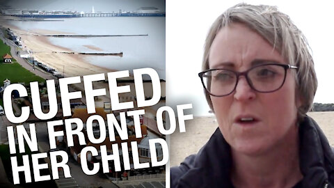 Mother handcuffed & humiliated for playing ball on the beach her with family