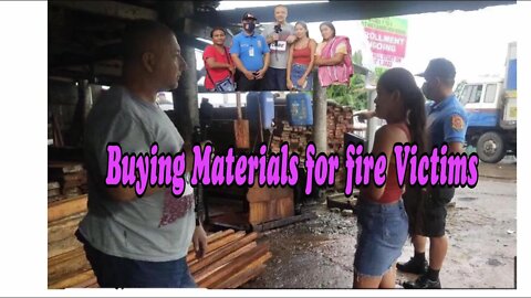 Fire Victims Receive Building materials Naga city, Philippines 2 of 2