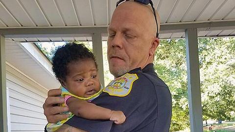 Cop Becomes Godfather For Baby He Saved