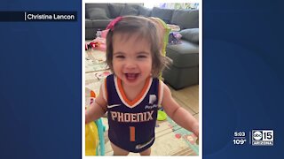 Babies, dogs and fans supporting Phoenix Suns