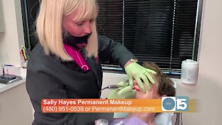 Sally Hayes shows how she applies permanent makeup to lips