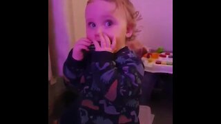 Toddler shows off adorable harmonica skills