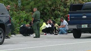 RAW VIDEO: Asian immigrants come ashore on Palm Beach ahead of President Trump's visit, police say