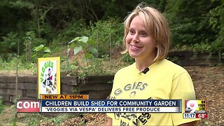 Children build shed for Fairmount community garden