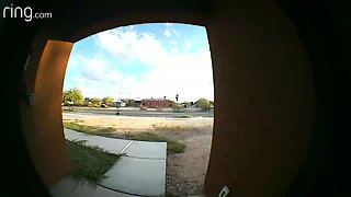 Porch pirate caught on camera in Tucson taking 2 packages