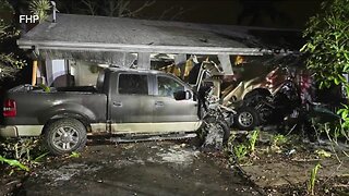 Neighbors help clear out debris after truck plows into Naples home